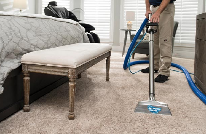professional carpet cleaning with vacuum cleaner