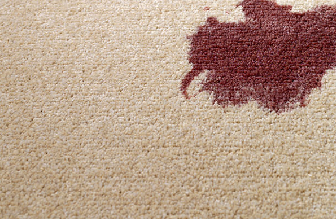 Carpet soiled with red wine