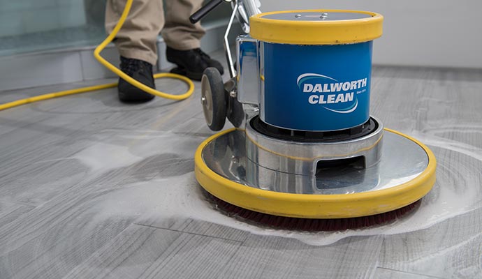 A person is cleaning floor