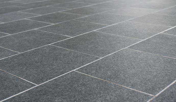 Clean dark granite stone tile floor