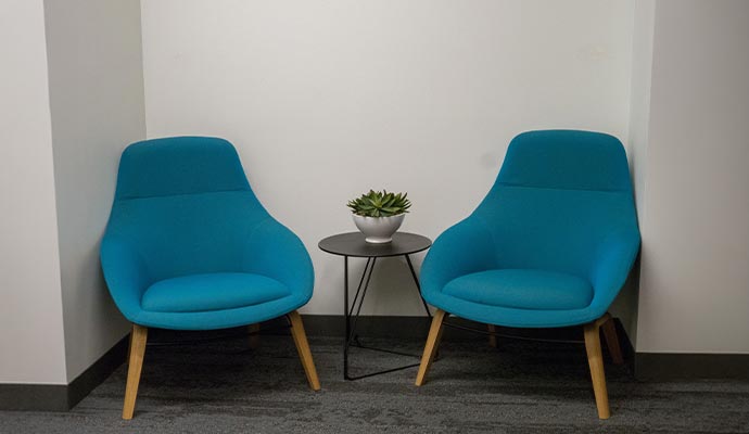 Clean blue chairs in the corner