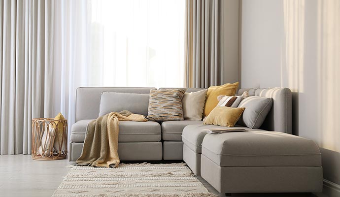 Clean sectional sofa in a bright living room