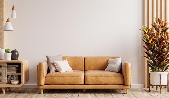 Clean tan leather sofa in a living room