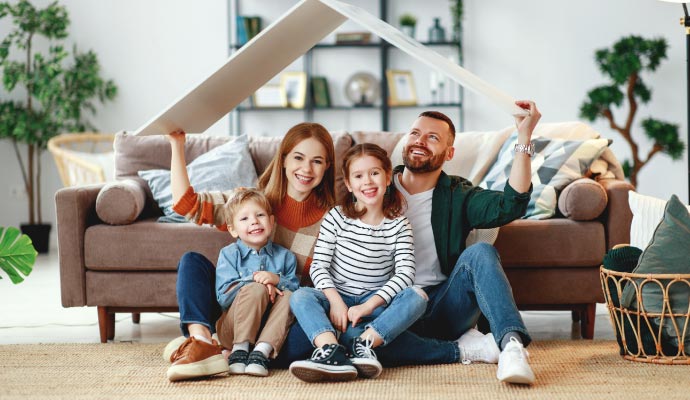 Happy family enjoying fresh air in a clean room