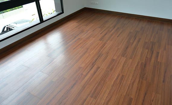 clean laminated empty floor room