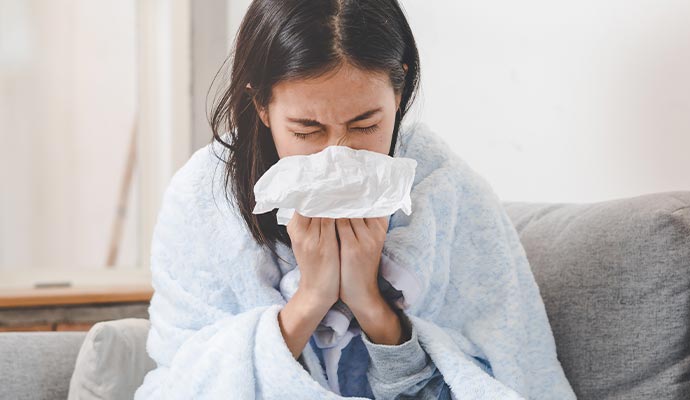 A person sneezing