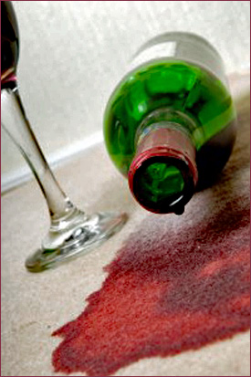 Red Wine has been fallen down in Carpet