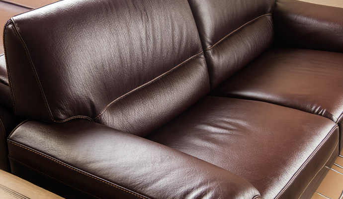 Dark brown leather sofa close-up