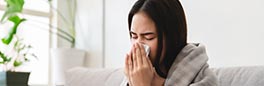 A woman facing cold allergy