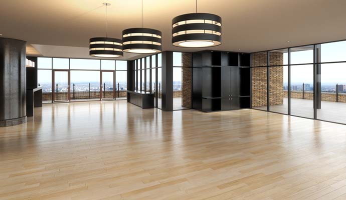Restored and polished light wood floors in a commercial office space