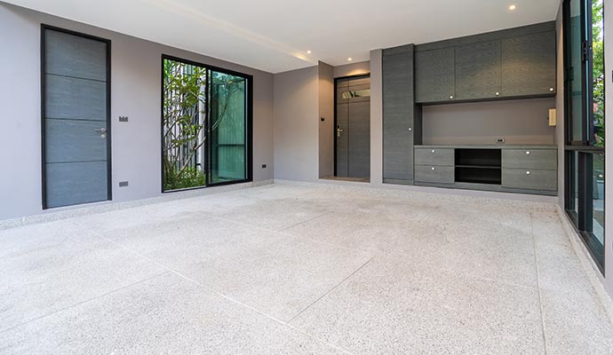 Speckled concrete floor in modern interior