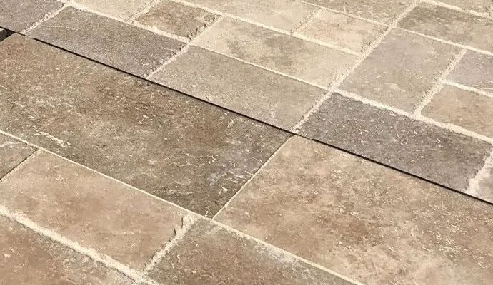 Close-up view of travertine floor