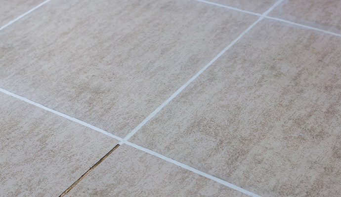 Tile floor with clean white grout lines