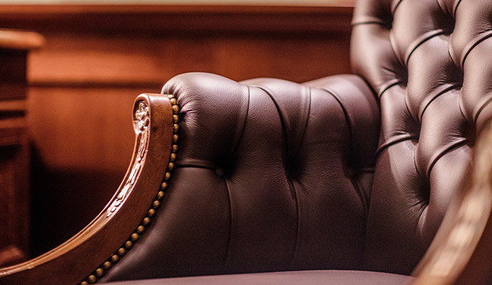 Tufted brown leather Chesterfield armchair